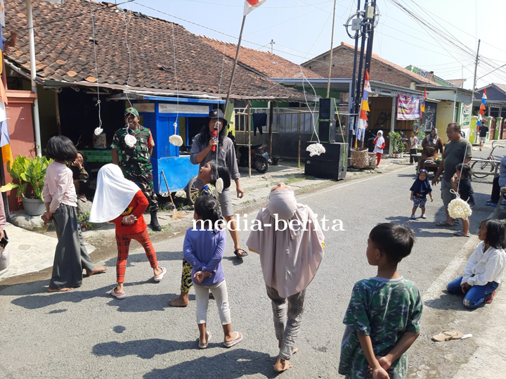 Babinsa Koramil Slawi Pantau Perlombaan Rakyat Sambut HUT RI Ke 79 Tahun 2024 